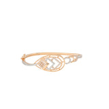 18K Rose Gold & CZ Bangle (13.2gm) | 


Pair this lovely 18k rose gold and cubic zirconia bangle from Virani with other rose gold Indi...