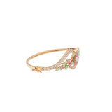 18K Rose Gold & CZ Bangle (14gm) | 


This beautiful 18k rose gold bangle is adorned with shining cubic zirconia and colorful enamel...