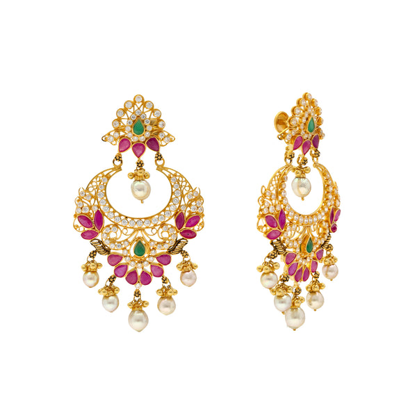 22K Yellow Gold & Gemstone Chandbali Earrings (27.3gm) | 
The radiant array of gems, pearls, and cz stones adorning this elegant pair of 22k yellow gold c...