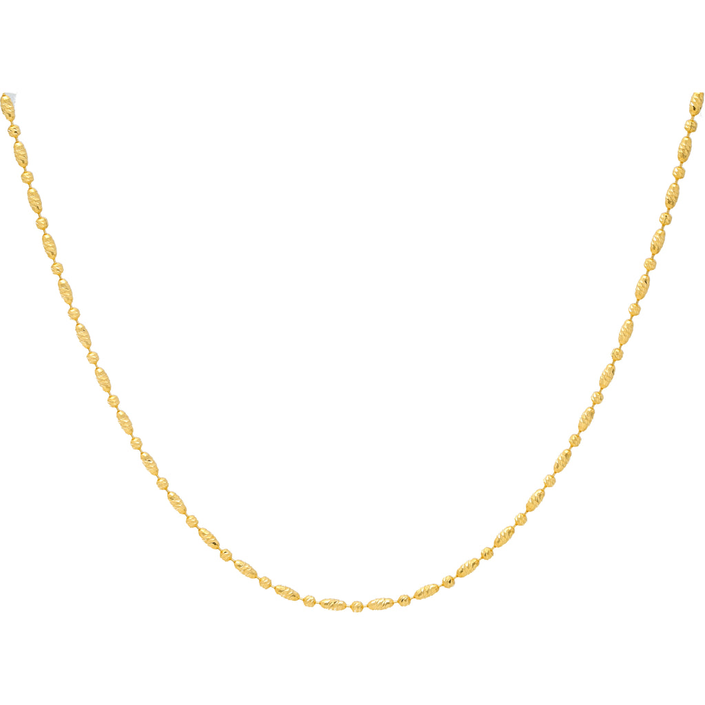 22K Yellow Gold 20in Oval Bead Chain (12 gms) | 
This simple 22k indian gold chain from Virani has a elevated beaded design that can be worn with...