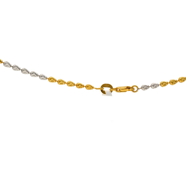 22k Yellow & White Gold Oval Bead Chain (12 gms) | 
This stylish and classy 22k gold chain has elegant beading in both 22k yellow and white gold. Fe...