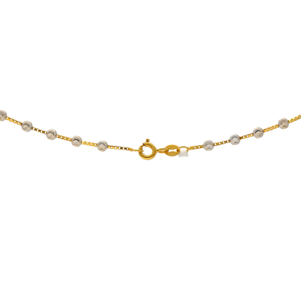 22Y Yellow & White Gold Beaded Chain (8 gms) | 
This simple 22k yellow gold chain has beautiful white gold beading and a minimalistic design. Fe...