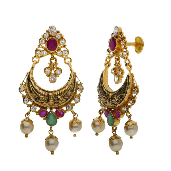 A side view of a pair of elegant earrings in an Indian jewelry set from Virani Jewelers | Use this 22K yellow gold set from Virani Jewelers to accessorize with elegance!

Includes convert...