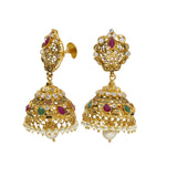 A side-view of a pair of Indian earrings in a jewelry set from Virani Jewelers | Introduce your wardrobe to 22K yellow gold jewelry with this exquisite set from Virani Jewelers!
...