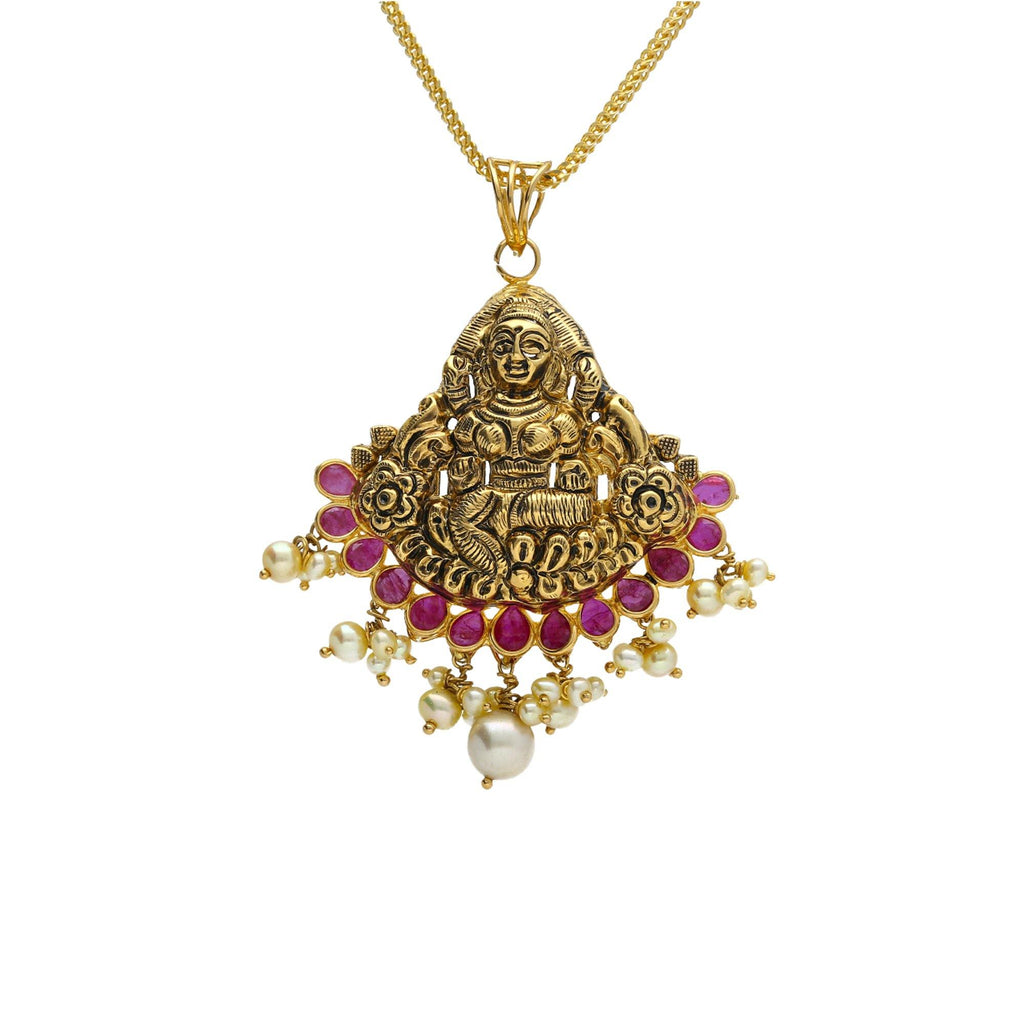 22K Yellow Antique Gold Laxmi Pendant W/ Underlining Rubies & Pearls - Virani Jewelers | 


Make a big statement with a small piece of significant jewelry with this precious 22K yellow a...