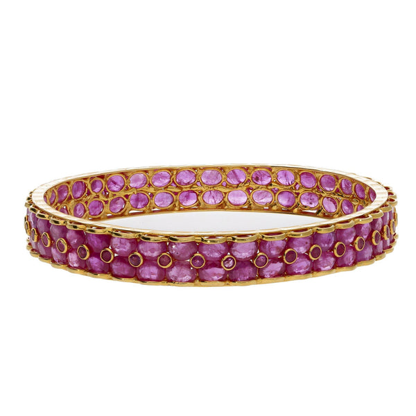 22K Yellow Gold Ruby Bangle W/ Brick Pattern Rubies - Virani Jewelers | 


Dive into the deep hues of this most radiant 22K yellow gold ruby bangle from Virani Jewelers!...