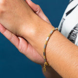 22K Multi Tone Gold Bracelet W/ Heart Charm & Rounded Beaded Link - Virani Jewelers | Enjoy a touch of golden elegance with this 22K multi tone gold charm bracelet for women from Vira...