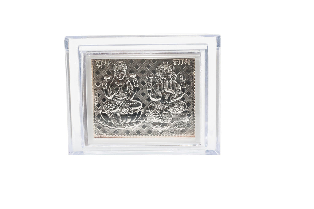 Silver Frame with Ganesh and Laxmi - Virani Jewelers | Silver Frame with Deity. Length 4 In Breadth 3 In.