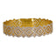 One 22K multi-tone bangle featuring white and gold polka designs and expert attention to detail.